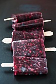 Homemade blueberry and pomegranate ice lollies