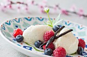 Quark mousse with berries and vanilla pods