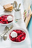 Rhubarb and cherry compote with cream and biscuits