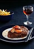 Beefsteak with prawns, mayonnaise and chips