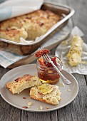 Bacon and cheddar scones with butter and dried tomatoes