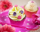 Cupcakes with pink and purple polka dots