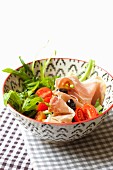 Chicory salad with cherry tomatoes, Prosciutto and balsamic vinegar