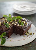 Chocolate and courgette cake with pistachios and fresh mint
