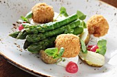 Asparagus with fish balls and potatoes
