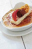 Crème brûlée with strawberries, truffle praline and honeycomb