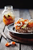 Bread topped with pickled root vegetables