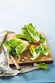 Fresh lettuce on a wooden chopping board