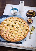 Apple and passion fruit tart with a lattice top