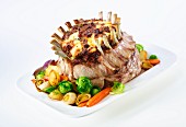 Stuffed pork crown with vegetables