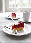 Two slices of raspberry sponge cake