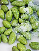 Olives being preserved in salt