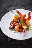 Fried prawns with bacon and chives