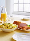 Easter brunch with scrambled egg, gammon and fresh orange juice