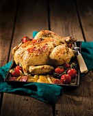 Roast chicken with tomatoes and potatoes