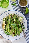 Grilled asparagus and courgettes with pine nuts and mustard dressing