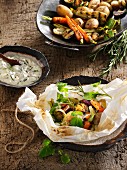 Spring vegetables with bellini potatoes in parchment paper