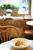 Damson dumplings with cottage cheese in a restaurant