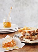 Slices of toast with honey comb and honey