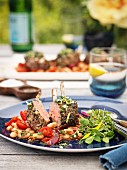 Rack of lamb with white beans and tomatoes