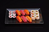 A sushi platter with maki and nigiri