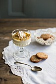 Passion fruit panna cotta with meringue, brittle and pecan nut biscuits