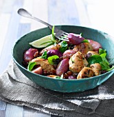 Chicken salad with red potatoes, baby spinach and raisins