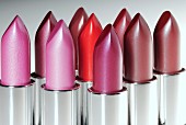 Various lipsticks in shades of red