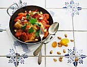 Chicken with apricots, almonds and peppers