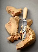 Tendons being removed from goose liver