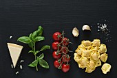 Ingredients for tortellini with tomato sauce