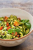 Courgette salad with pesto and tomatoes