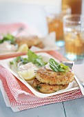 Salmon fritters with lemon and a dip
