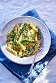 Penne with asparagus, cheese and herbs
