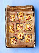 Puff pastry tartlets with apple and pomegranate seeds