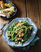 Butter beans and mange tout with almonds and feta cheese