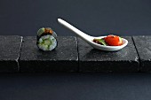 East meets West: maki sushi and tomatoes with basil