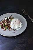 Rice salad with Bhutan red rice and poached egg (Asia)