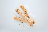Tomato breadsticks with black caraway seeds