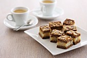 Slices of spiced cake served with coffee