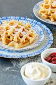 Barter waffles with jam and cream