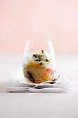 Tutti frutti with apples, glace cherries and pistachios