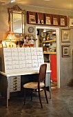 Retro desk with drawer unit on top and shelves above doorway