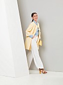 A lunchtime outfit – a blue linen shirt with white trousers and a yellow coat