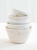 A stack of white bowls