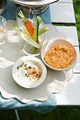 A duo of dips (nut dip, pepper paste) with vegetable crudites