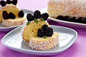 Swiss roll with blackberries and coconut