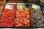 Prawns from Galicia and langoustines (raw and cooked) at the fish market in Bilbao, Basque Country, Spain
