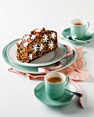 A slice of fruit cake decorated with sugar stars