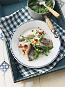 Soused herring with a bean sauce